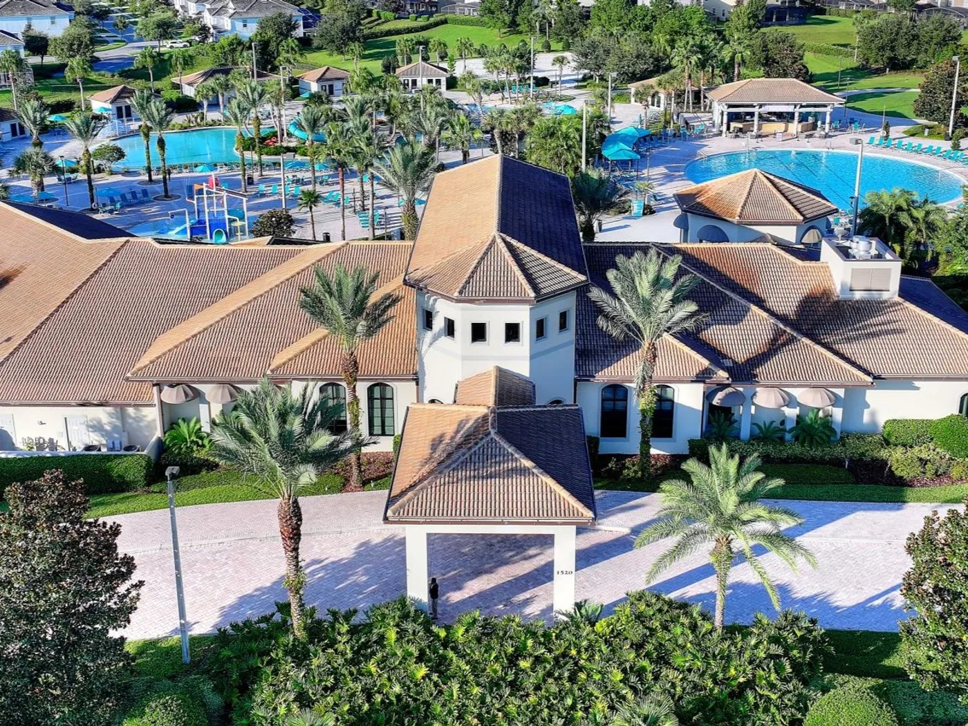 Aerial view of the Champions Gate clubhouse and resort pool area